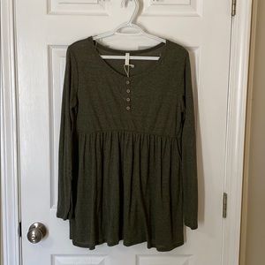 Green long sleeve top.